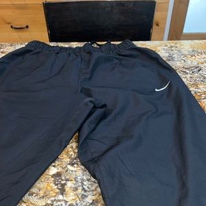 Nike warm ups size large ankle zippers